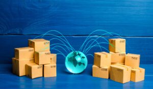 Boxes connected with the planet. Concept of delivering goods and products around the world