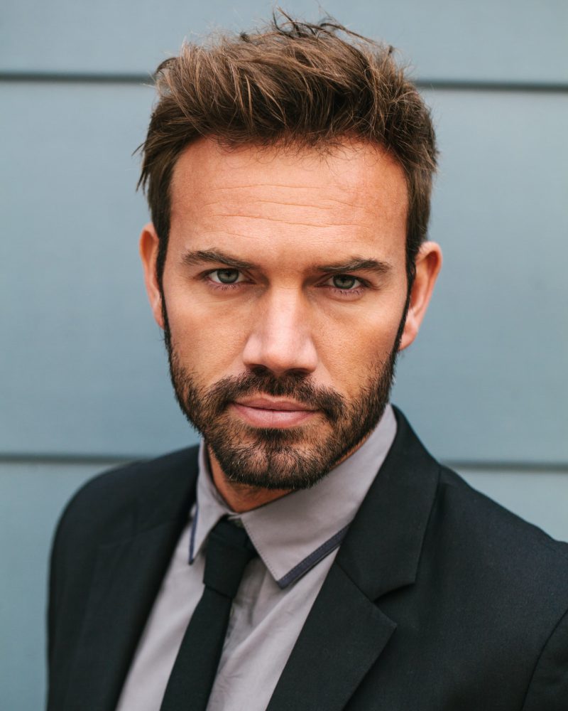 Portrait of a Young Businessman in the Street